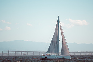 Sailing yacht at sea telephoto, a Sports & Recreation Photo by SkyNext