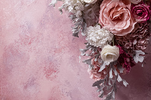Romantic floral arrangement with pink and white blooms on a text, a Photo by Studio ANNA