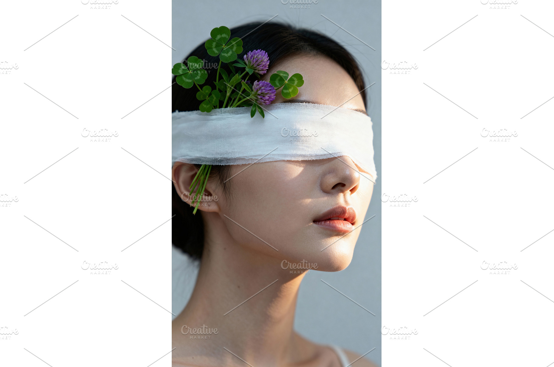 Woman blindfolded with clover and, a Beauty & Fashion Photo by tilialucida