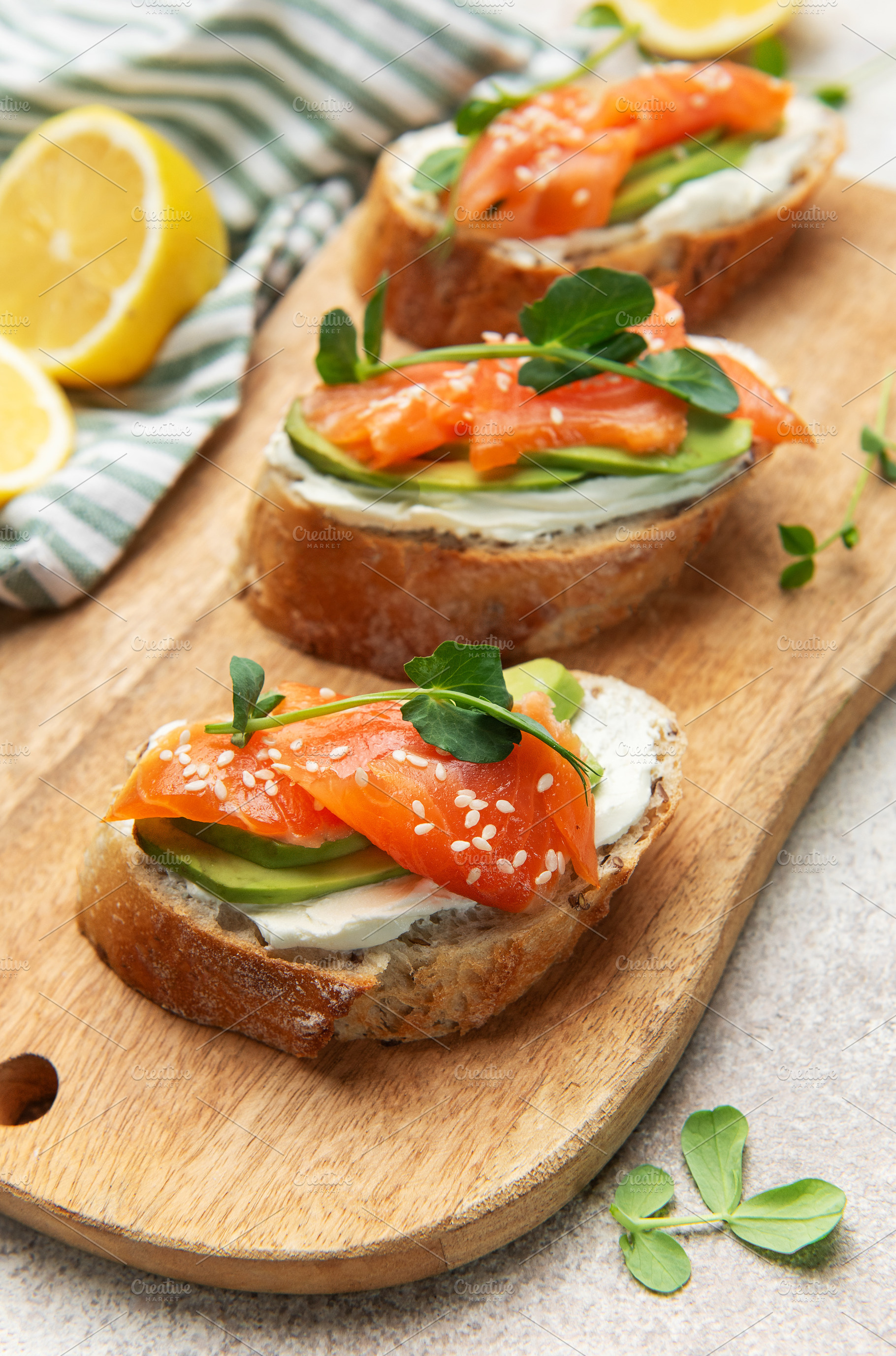Smoked salmon toast with avocado and cream cheese, a Food & Drink Photo by Olena Rudo