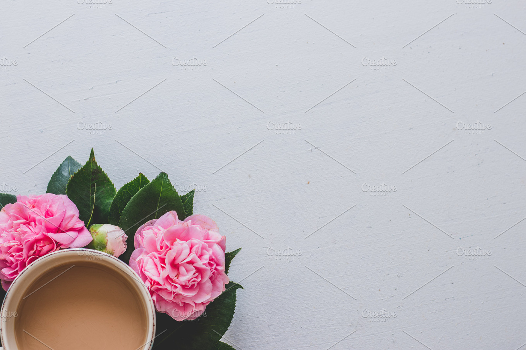 Flowers and Tea Flatlay on White, a Business Photo by René Jordaan Photography