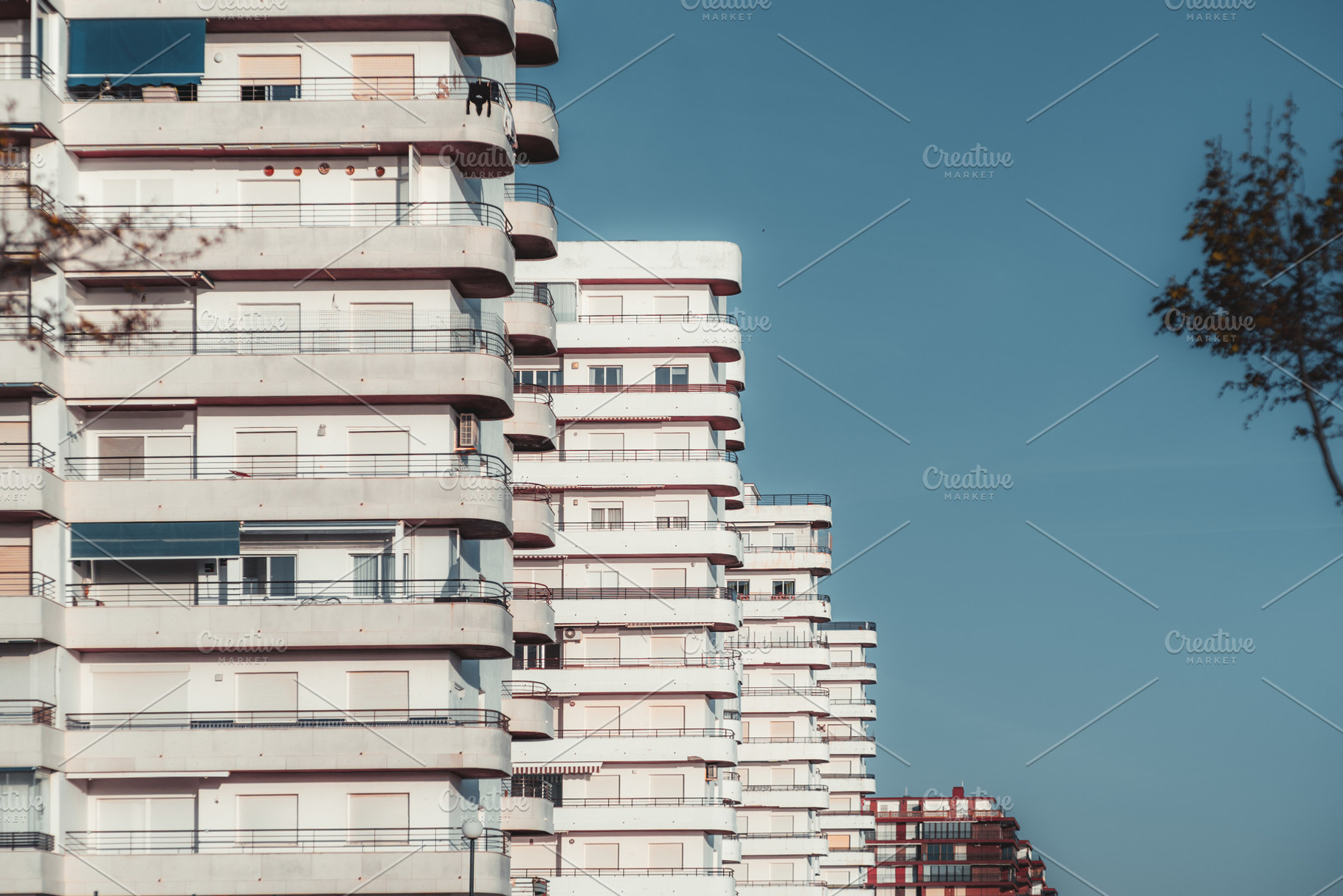 Modern white apartment buildings, an Architecture Photo by SkyNext