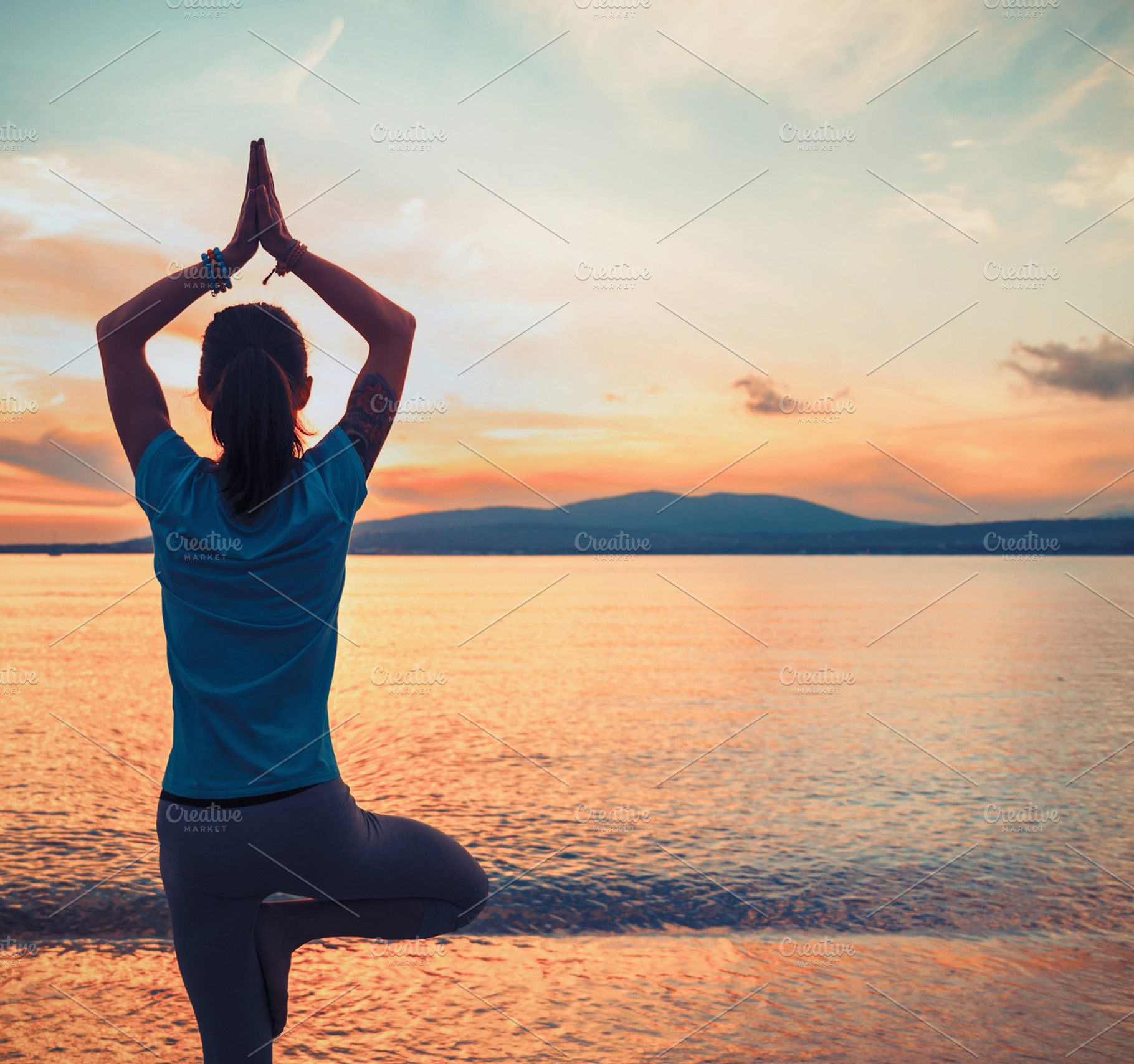 Woman doing yoga exercise stock photo containing woman and yoga, a Sports & Recreation Photo by P&G