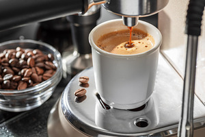 Automatic coffee machine. Pouring coffee into the coffee cup clo, a Food & Drink Photo by Volff