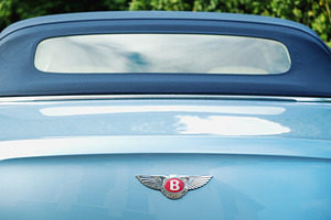 Bentley luxury car logo emblem, a Transportation Photo by BOOCYS