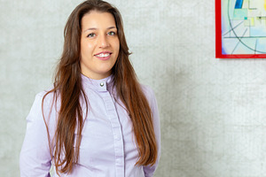 Young female doctor smiling confidently in her office, a Health & Medical Photo by Antonio Gravante Market