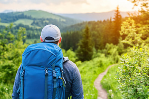 Male hiker with backpack on scenic, a Sports & Recreation Photo by Lermont51