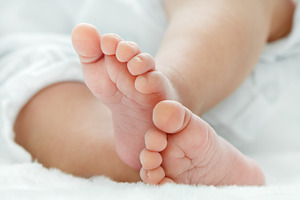 Newborn baby's feet containing baby, foot, and human