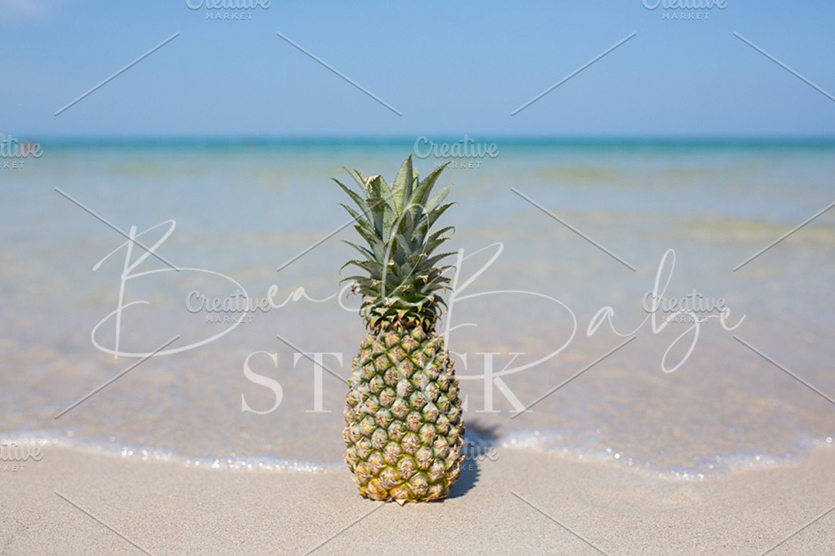 A pineapple on the beach, a Food & Drink Photo by Beach Babe Stock (Photo 1 of 2)