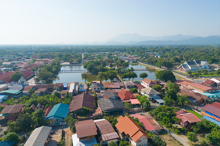 Aerial view of local residential neighborhood roofs. Urban housi