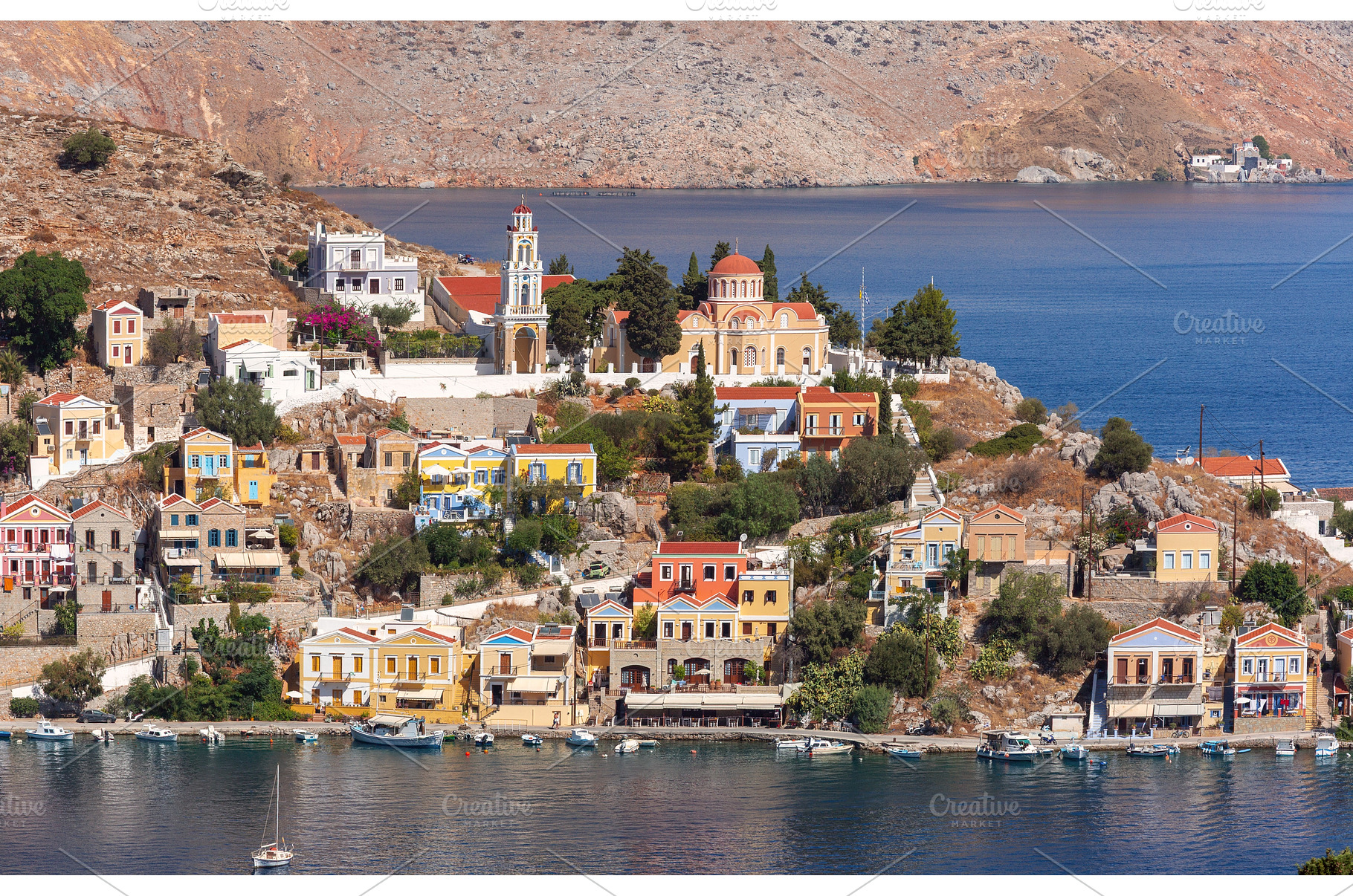 Symi harbor hillside with colorful, an Architecture Photo by kavalenkava
