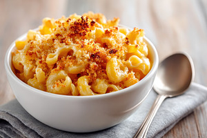 Baked macaroni and cheese with breadcrumbs, a Food & Drink Photo by AlyaAnd