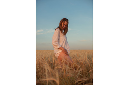 Woman in White Shirt at Sunset in, a Person Photo by Jan Jack Russo Media