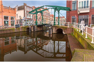 Drawbridge over canal in Leiden, an Architecture Photo by kavalenkava