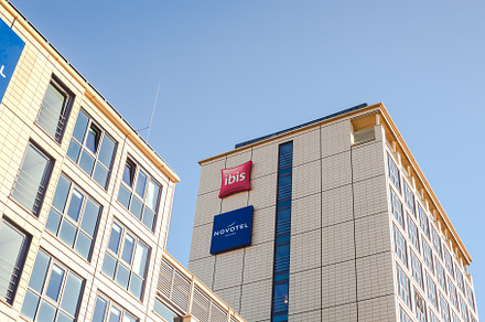 Novotel suites Ibis logo at hotel building Munich, an Architecture Photo by Dvoevnore photos