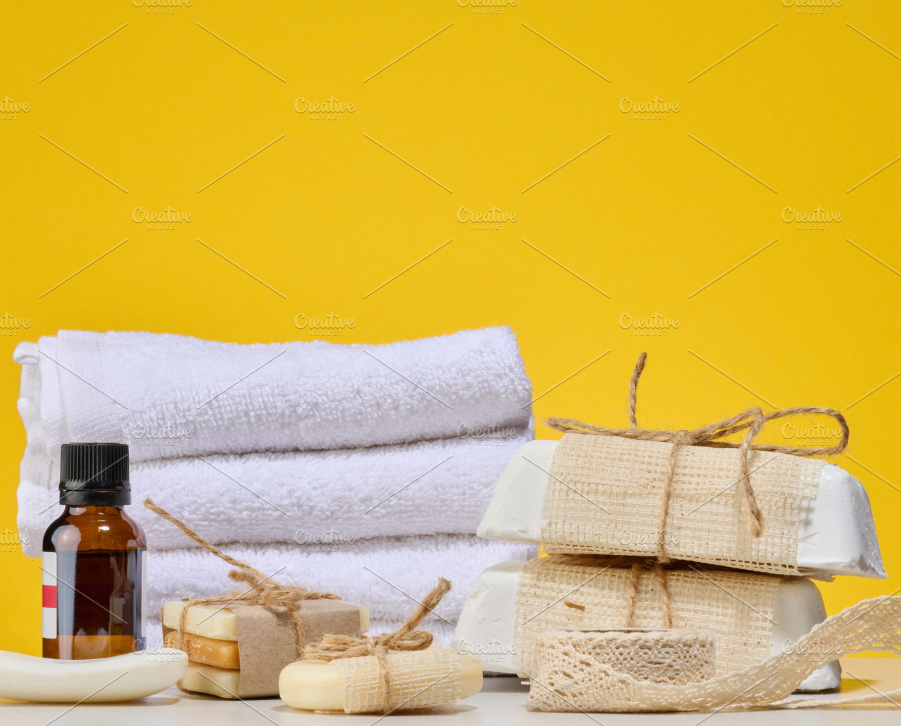 Spa and natural cosmetics items, white towels, several bars of h, a Beauty & Fashion Photo by ndanko