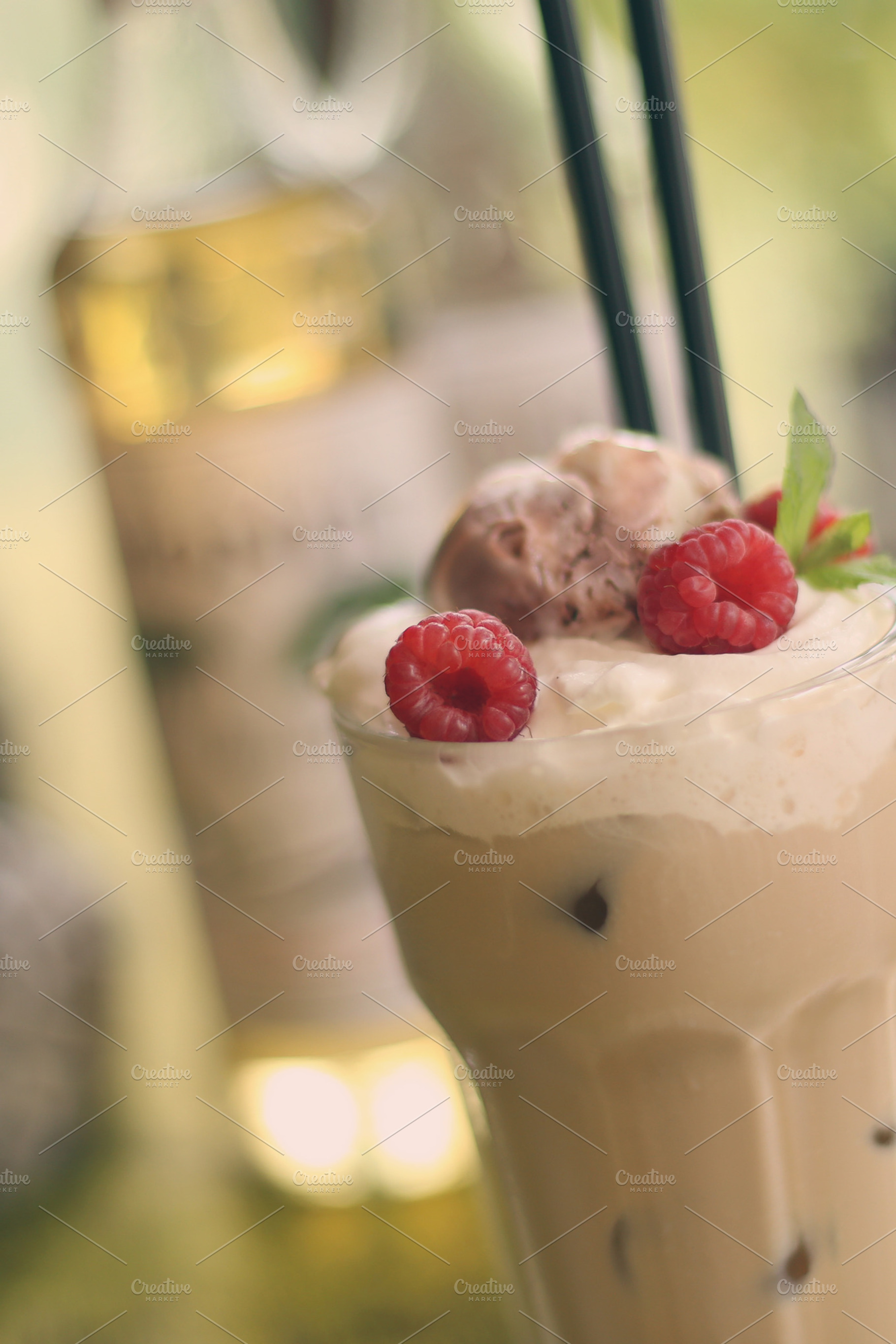 Iced coffee with ice cream containing raspberries, iced coffee, and coffee