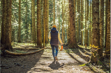 A woman in warm clothes enjoys a, a Nature Photo by Elizaveta Galitskaya