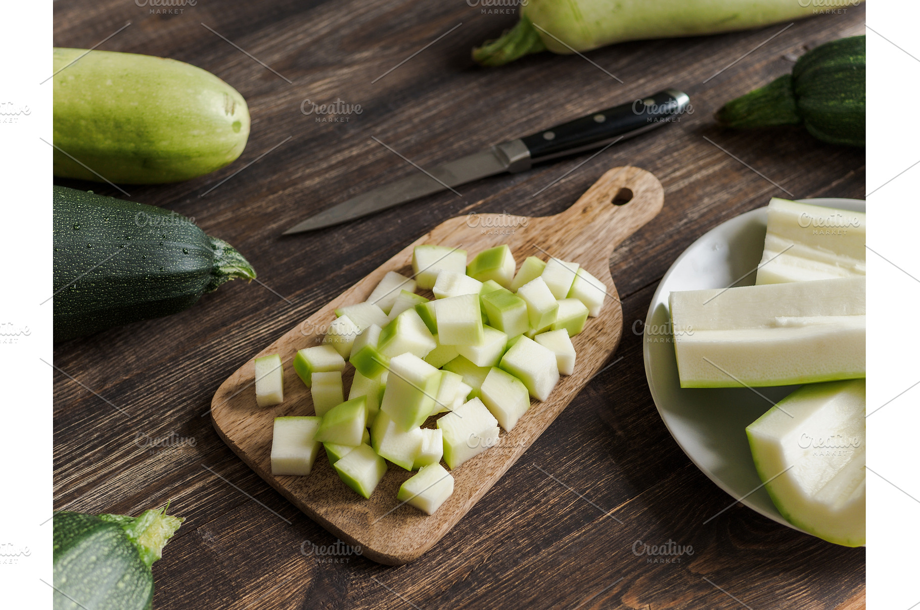 Zucchini harvesting concept., a Food & Drink Photo by Fascinadora