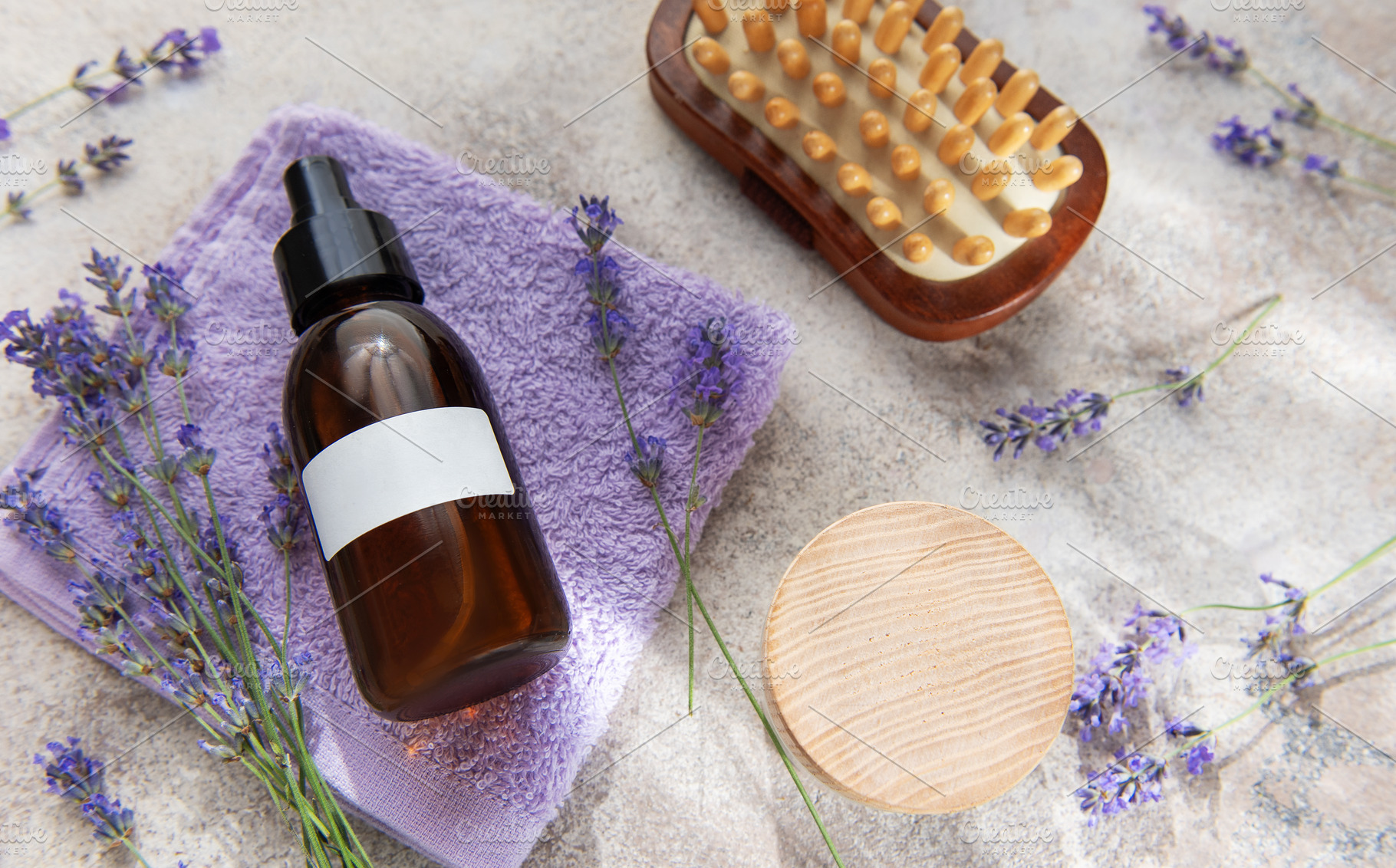 Lavender essential oil with spa massage accessories, a Health & Medical Photo by Olena Rudo