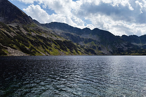 Majestic mountain lake at Zakopane Poland with rugged peaks and clear blue wate, a Nature Photo by AS photostudio
