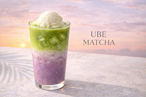 Ube matcha drink in glass with gradient layers against neutral b, a Photo by Dvoevnore photos