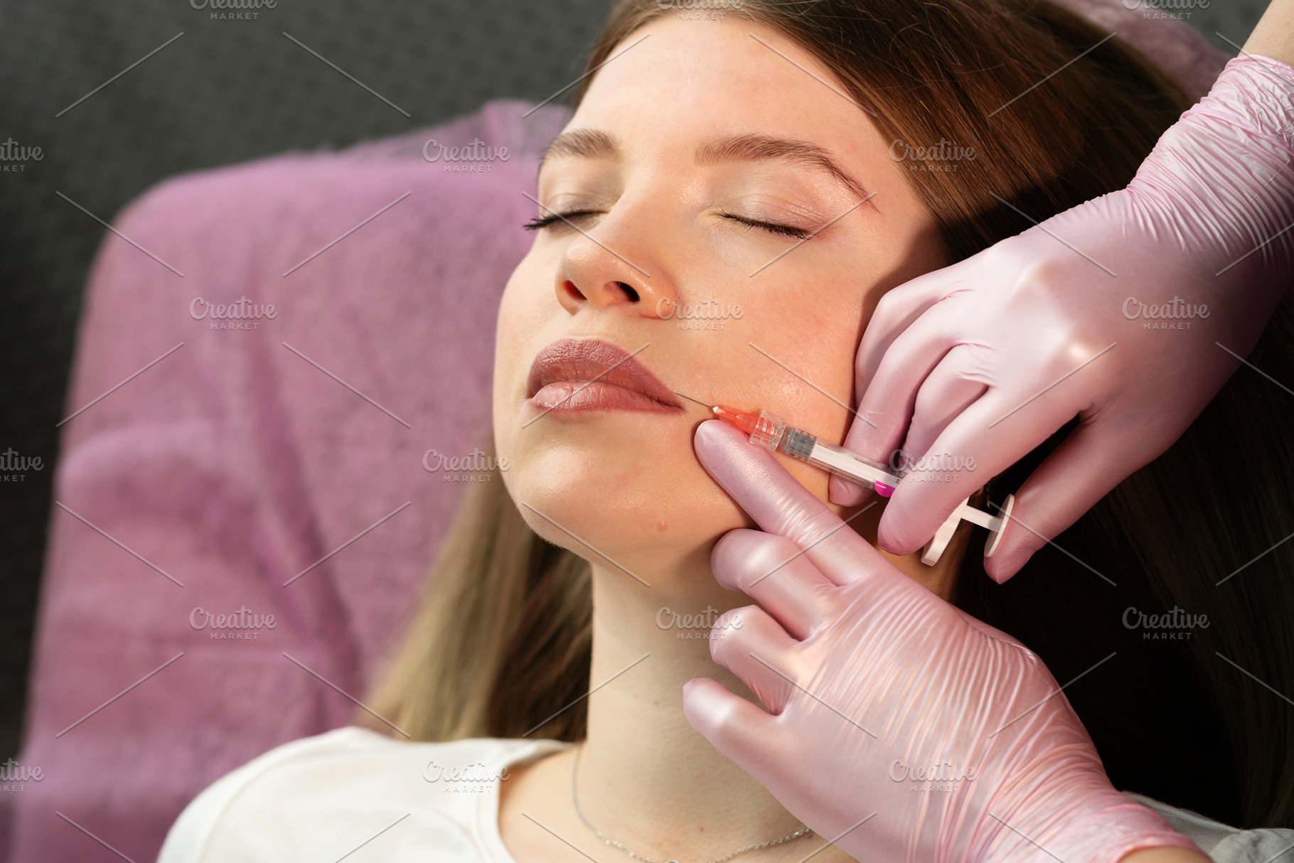 Clinic specialist performs precise, a Person Photo by Elena Vagengeim