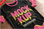 T-shirt On Wooden Floor PSD, a Shirt Mockup by Bruno's Shop (Thumbnail 1 of 3)