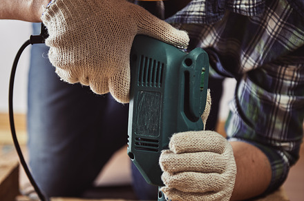 Craftsman with drill, an Industrial Photo by Eastrada