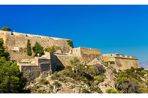 Walls of santa barbara castle in alicante spain featuring spain, alicante, an Architecture Photo by Leonid Andronov