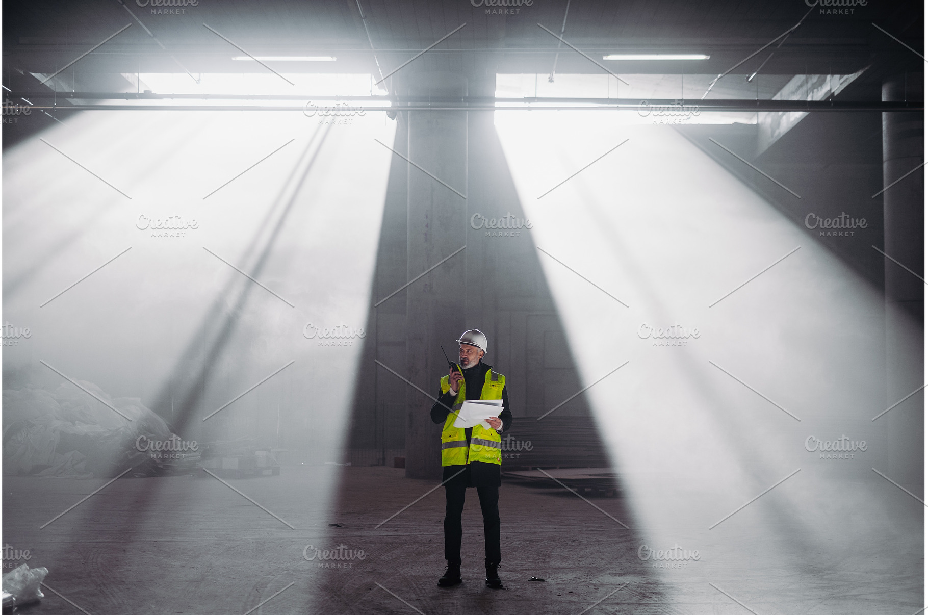 Construction foreman giving, an Industrial Photo by HalfPoint