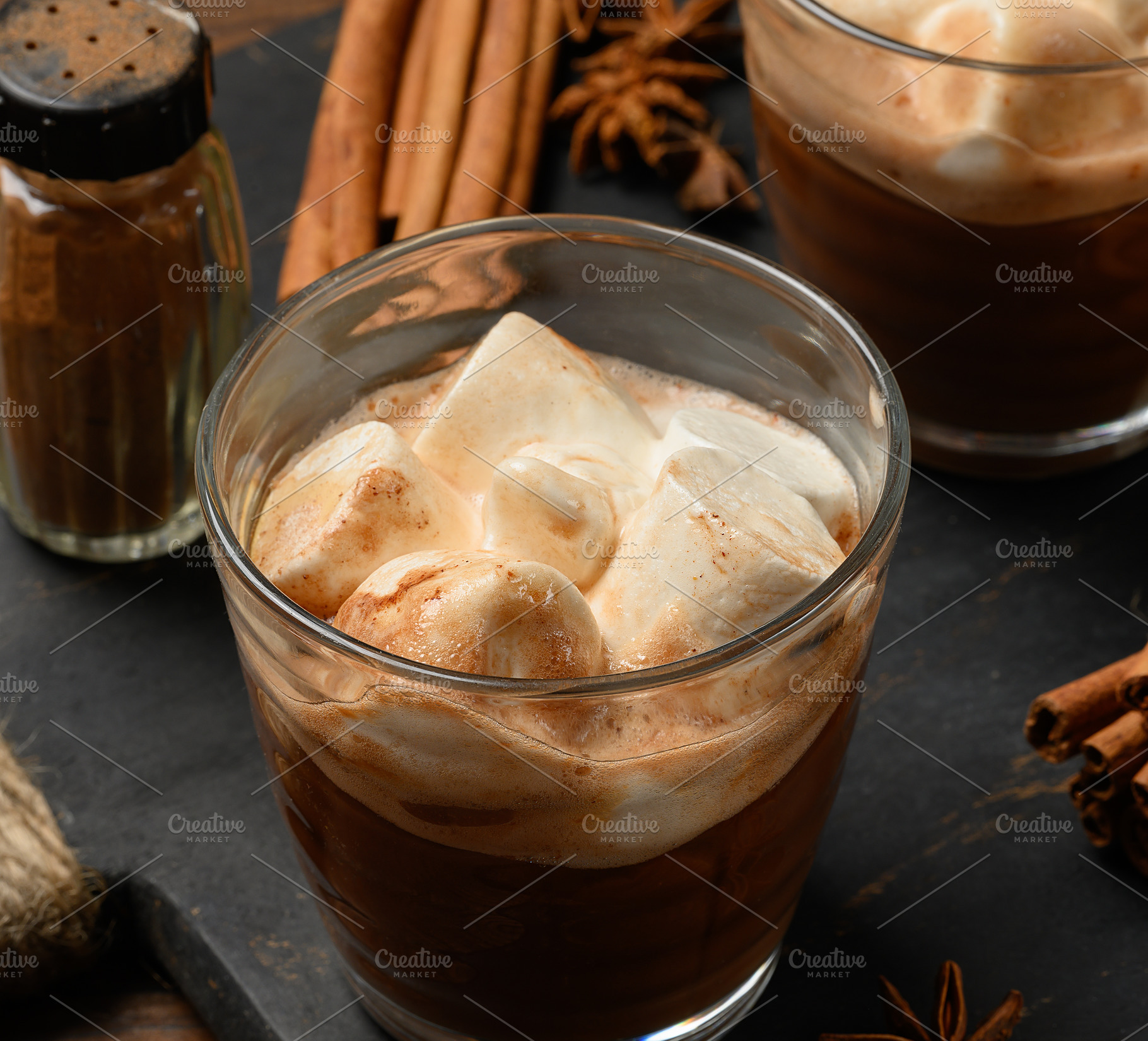 Hot chocolate with fluffy marshmallows on a wooden board., a Food & Drink Photo by ndanko