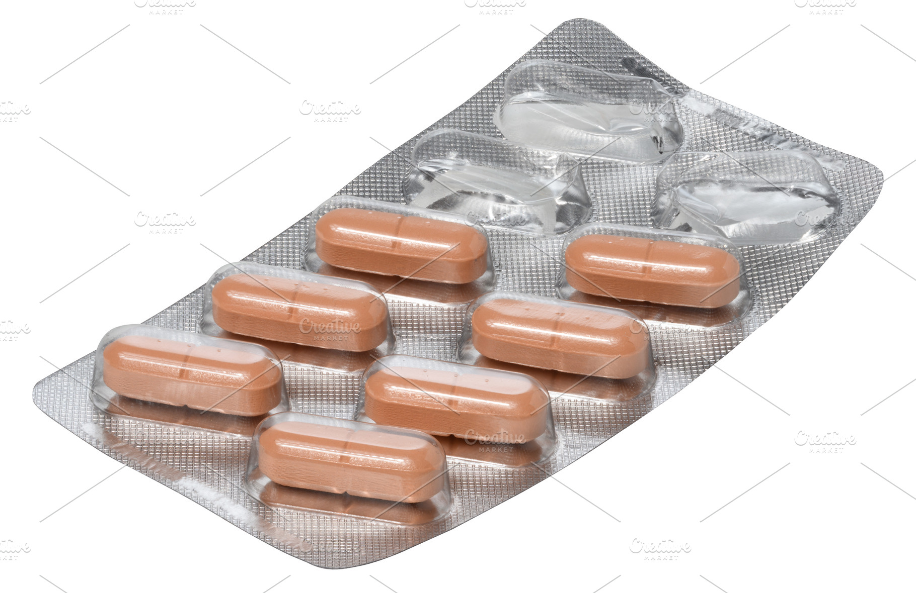 Silver blister pack containing orange oblong pills. Two compartm, a Health & Medical Photo by ndanko