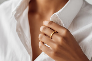 Close up of a minimalist gold ring, a Beauty & Fashion Photo by MistyDay