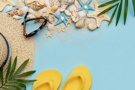 Beach accessories creating a summer holiday background, evoking
