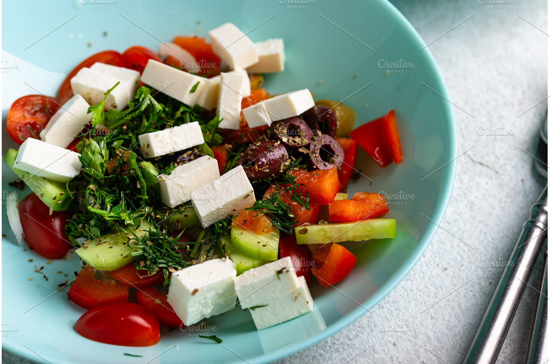 Greek salad with vegetables, olives, a Food & Drink Photo by Yulia Furman