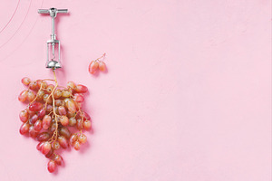 Natural wine production concept stock photo containing grape and rose