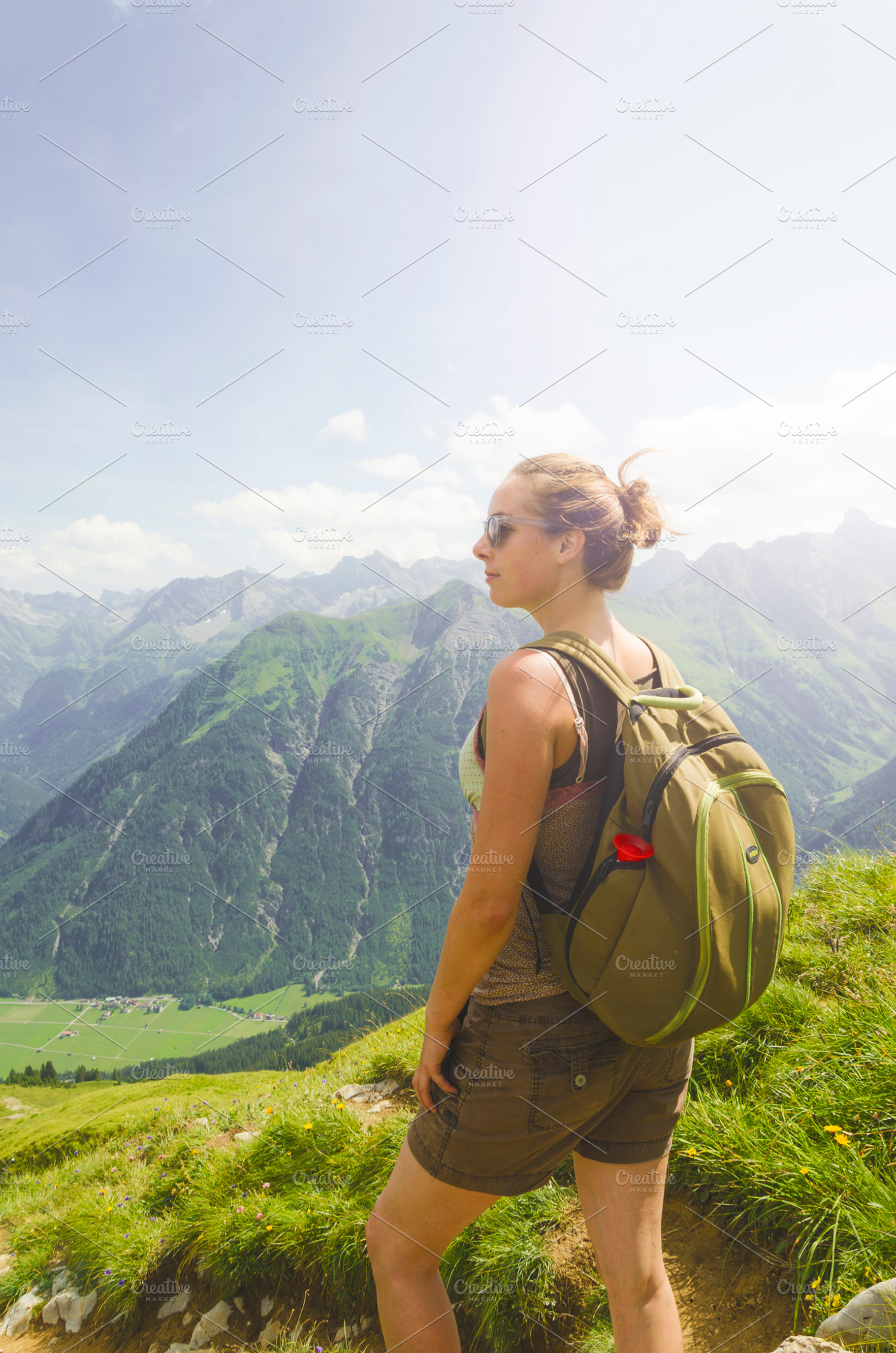Hiker in austria containing hiking, backpack, and adventure, a Person Photo by Twin Design
