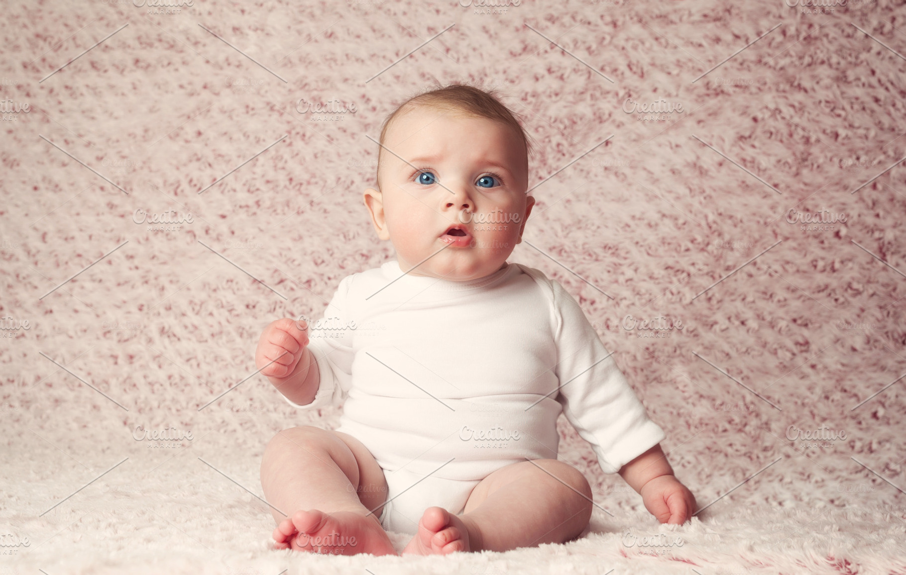 Newborn baby girl with white bodysui, a Person Photo by Antonio Gravante Market