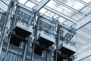 Elevators in a business center, an Architecture Photo by BOOCYS