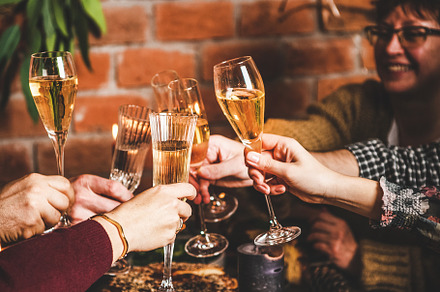 People celebrating Christmas with, a Food & Drink Photo by Foxys