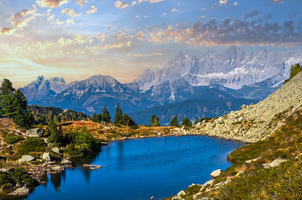 Calm autumn Alps mountain lake with clear transparent water and, a Nature Photo by YuriyB