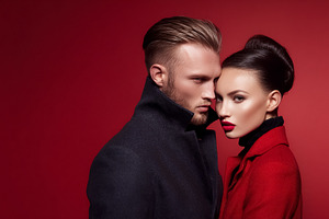 Couple embracing romance and fashion on Valentine's Day over a r, a Photo by Studio ANNA