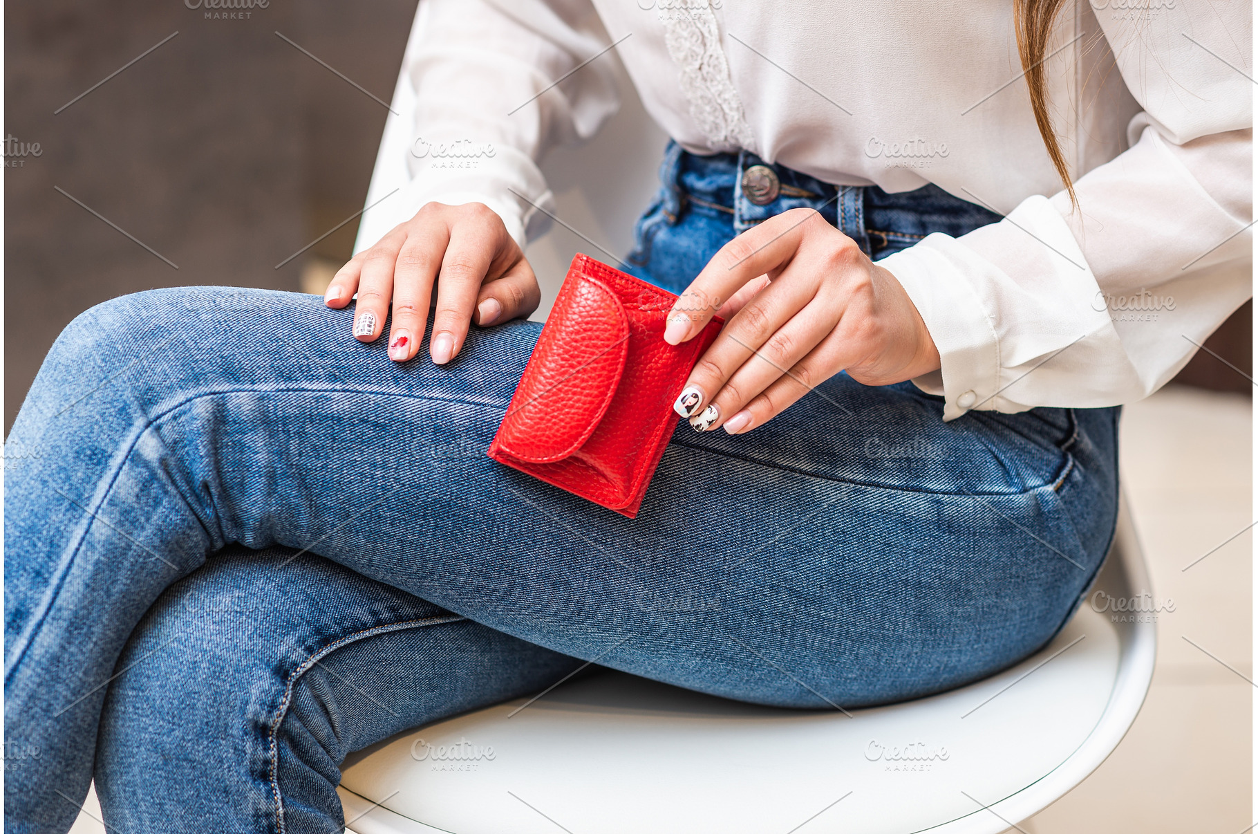 Girl in jeans holds a red little, a Person Photo by wip3out