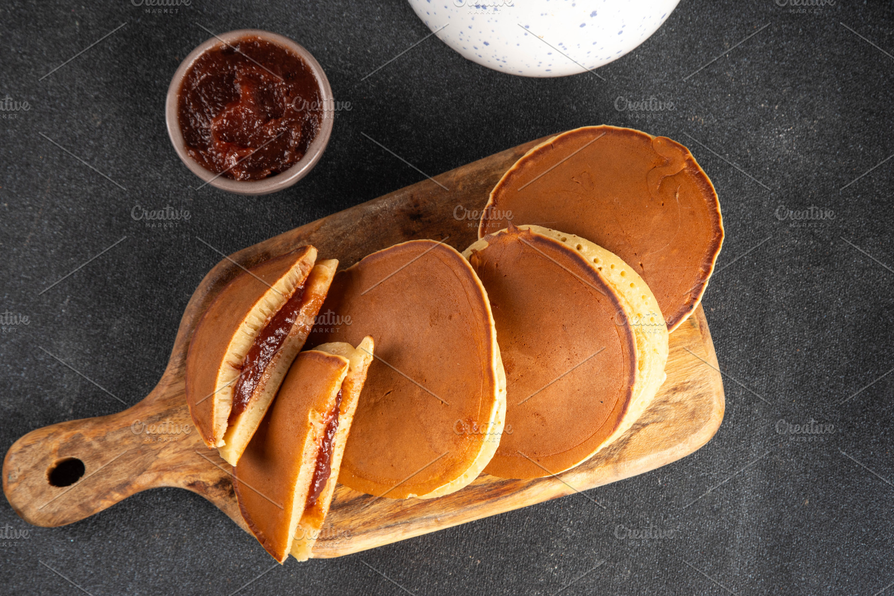 Dorayaki, classic Japanese pastry with sweet red bean paste or s, a Food & Drink Photo by Rimma