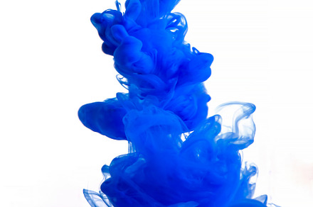 Blue clouds of ink in liquid isolated on white, an Abstract Photo by eleana