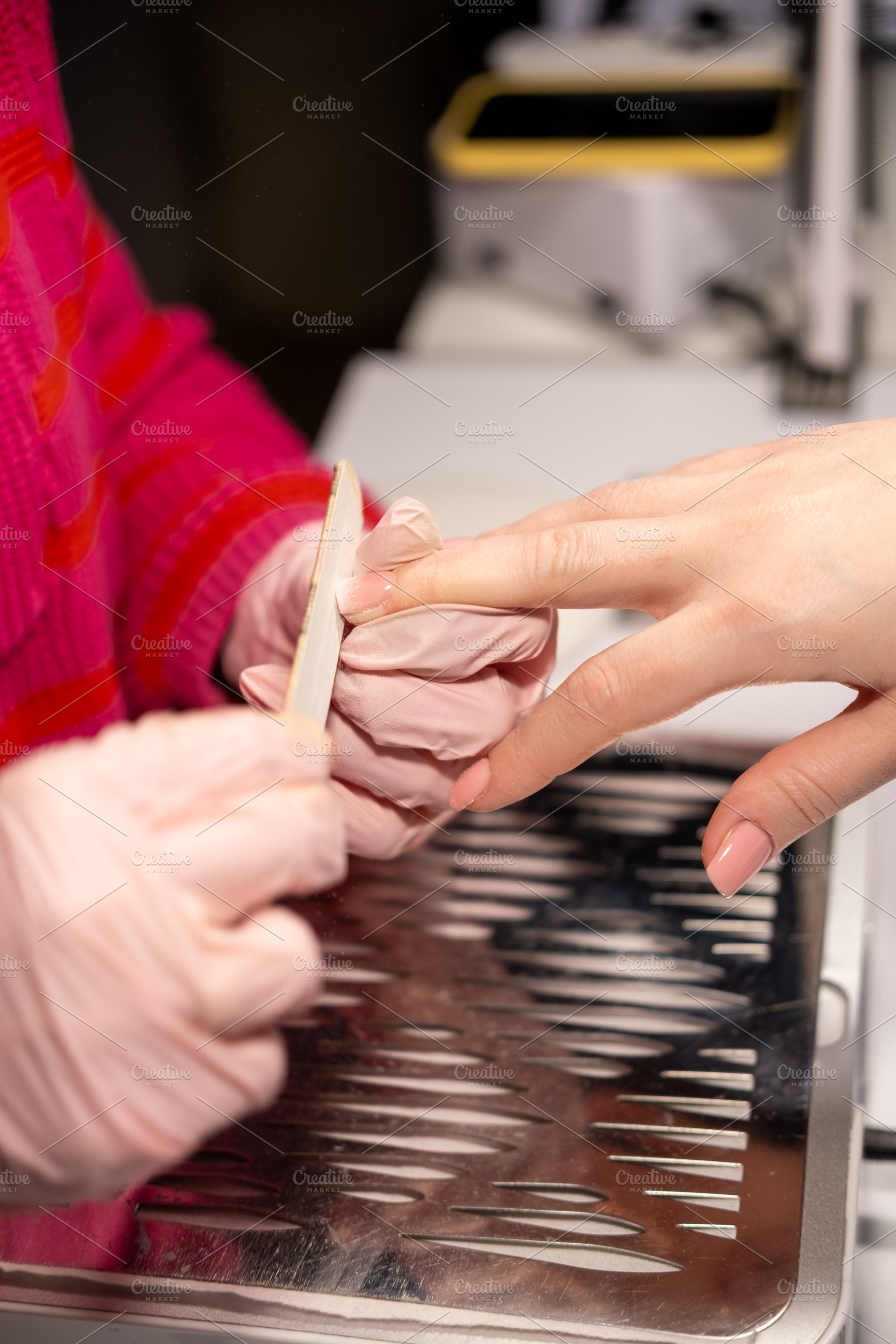 Manicure process nail file hands glove emery board, a Person Photo by Photo Drive Studio