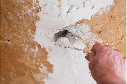 Repairing the wall - Man putting, an Industrial Photo by Koldunova