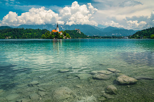 Travel location with clean lake, a Nature Photo by Alpine Dreams