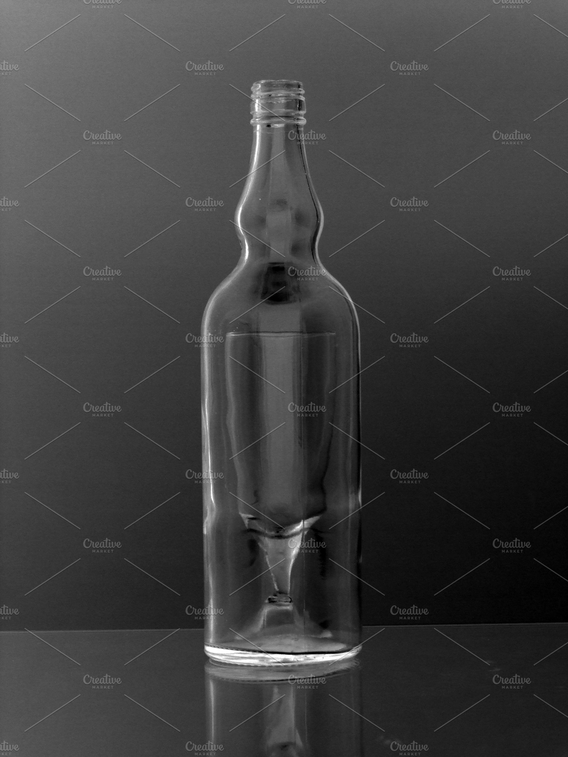 Bottle Containing Bottle Wine And Black